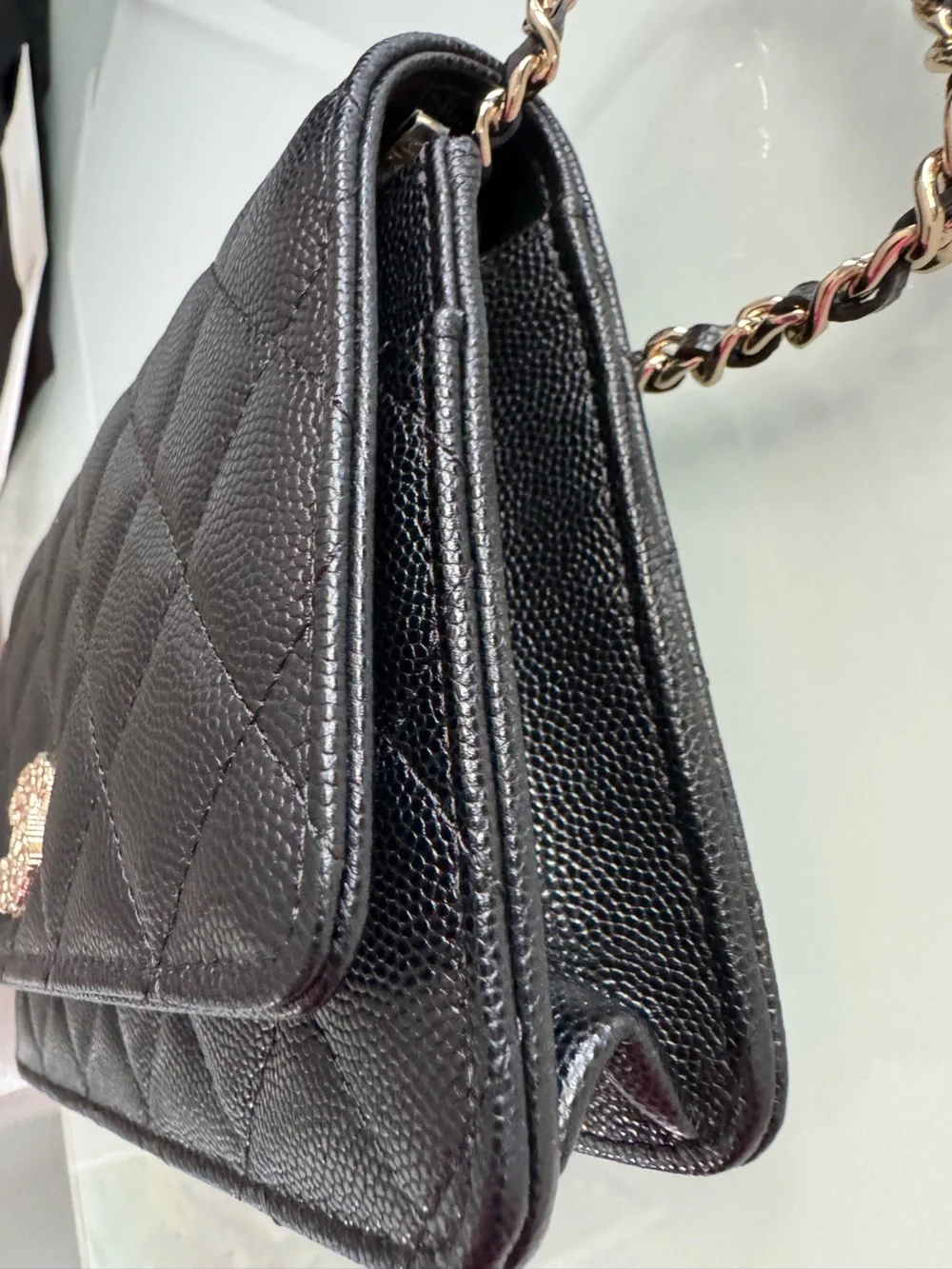 CHANEL WOC Black caviar leather with Gold Hardware and heart shaped crystal logo
